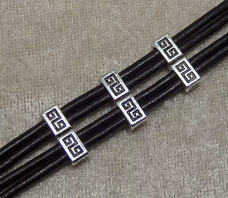 Connector/slider/mellandel, för platta remmar, mönstrad antiksil