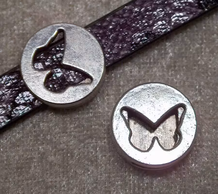 Mellandel, för platt rem, rund m fjäril, antiksilver