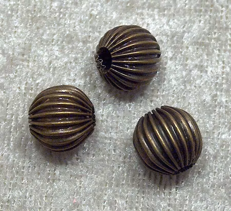 Melonpärlor, antikbrons, 10 mm