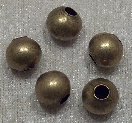 Rund bronsfärgad metallpärla, 12 mm, stort hål