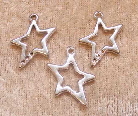 Berlock, asymmetrisk stjärna, antiksilver