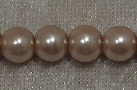 Vaxad glaspärla, Beige