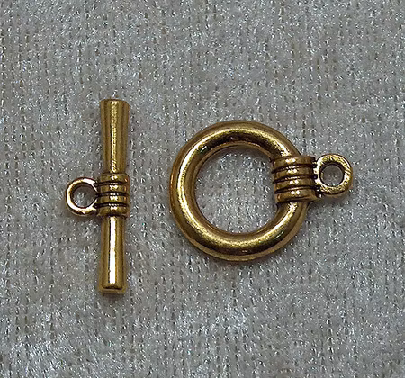 Togglelås, Antikguld