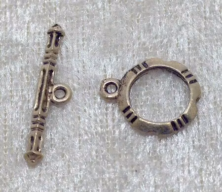 Togglelås, antikguld
