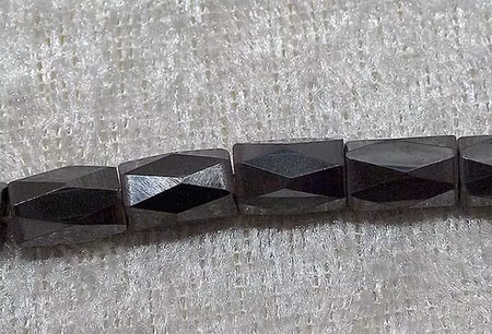 Hematit Facetterad cylinder 8x5 mm, MAGNETISK
