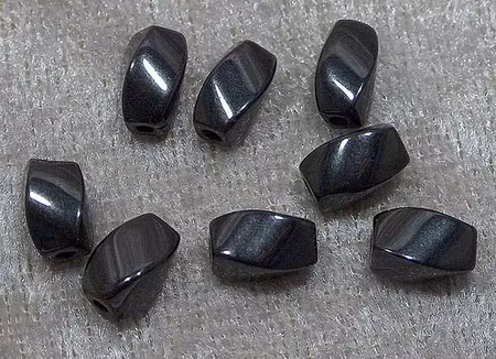 Vriden tunna i hematit, 8x5 mm