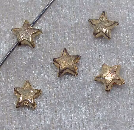 Mellandel, slät stjärna, guld