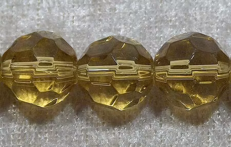 Facetterad rund kristallpärla, Honung, 12 mm