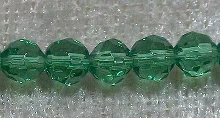 Facetterad rund kristallpärla, Grön, 4 mm