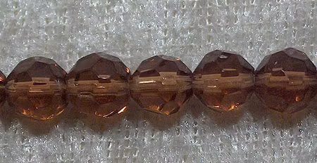 Facetterad rund kristallpärla, Brun, 6 mm