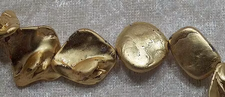 Snäckskalsbumlingar, Guld