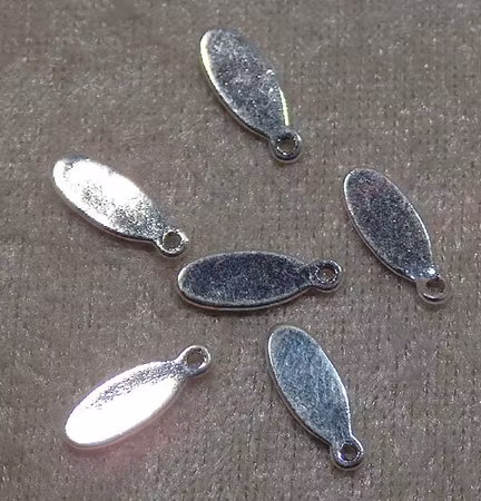 Oval tag, silverpläterad