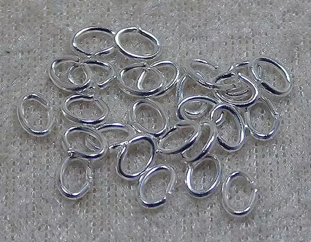Oval bindring, silverpläterad, 6x4x1 mm