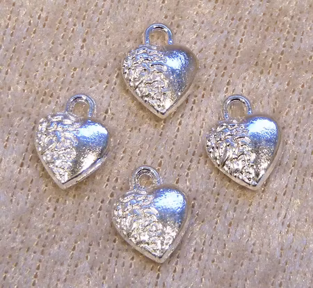 Liten hjärtberlock, ljus silver