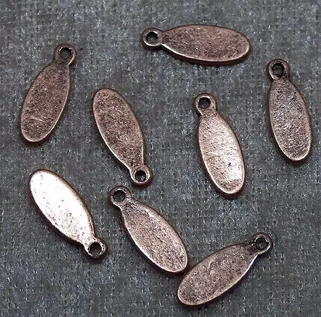 Oval tag, antik koppar