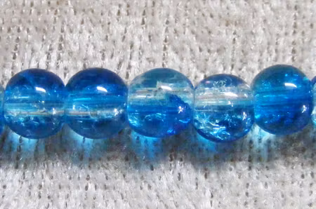 Krackelerad glaspärla, 6 mm, blå/transparent