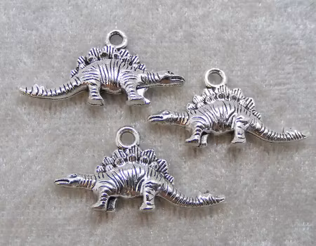 Berlock, dinosaurie, antiksilver