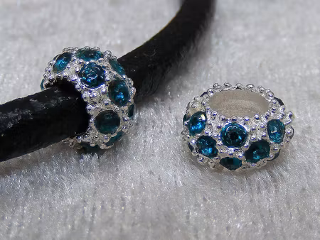 Mellandel, rondell ljus silver teal/mörk turkos strass,stort hål