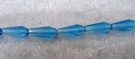 Facetterad droppe, turkos, ca 10x4,3 mm