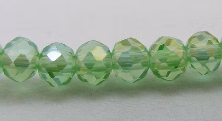 Facetterad abacus, ljusgrön, 4x3 mm