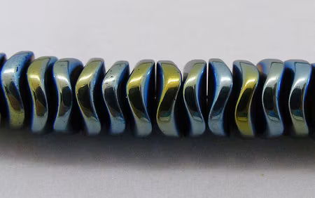 Hematitrondell, vågig, grön, 6 mm