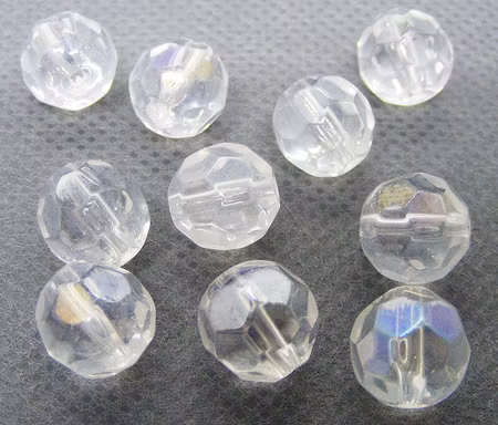Facetterad rund kristallpärla, transparent AB, 10 mm