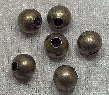 Rund bronsfärgad metallpärla, 8 mm, stort hål