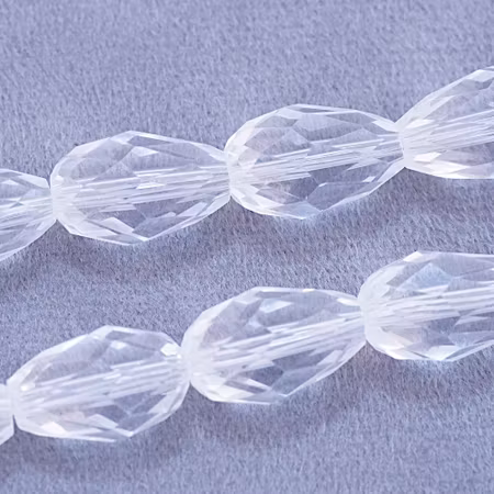 Facetterad glasdroppe, transparent, 15x10 mm