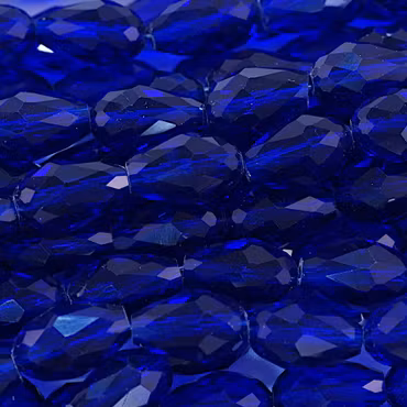 Facetterad glasdroppe, kungsblå, 15x10 mm