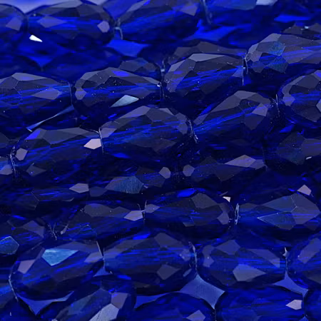 Facetterad glasdroppe, kungsblå, 15x10 mm