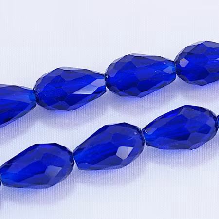 Facetterad glasdroppe, kungsblå, 15x10 mm