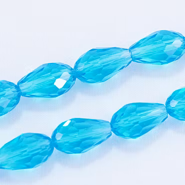 Facetterad glasdroppe, turkos, 15x10 mm