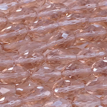 Facetterad glasdroppe, champagne, 15x10 mm