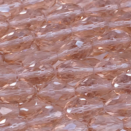 Facetterad glasdroppe, champagne, 15x10 mm
