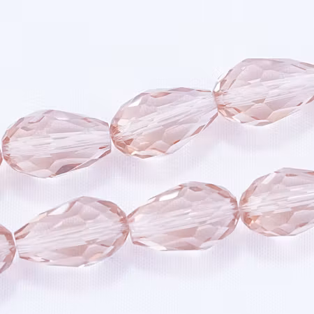 Facetterad glasdroppe, champagne, 15x10 mm