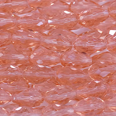 Facetterad glasdroppe, laxrosa, 15x10 mm