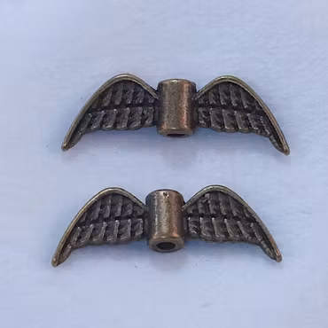 Änglavingar, antikbrons