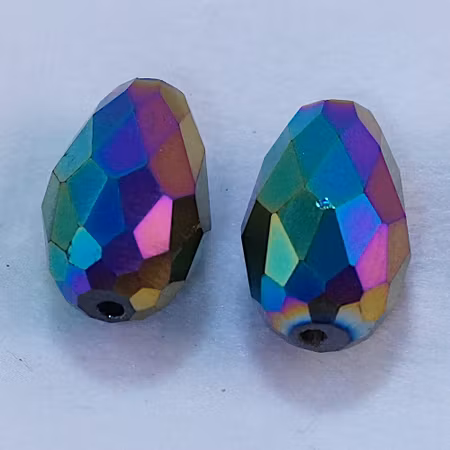 Facetterad och elektropläterad glasdroppe, 15x10 mm