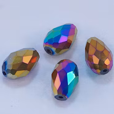 Facetterad och elektropläterad glasdroppe, 15x10 mm
