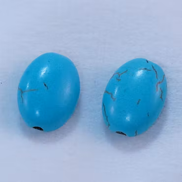 Oval turkos 13,5 x 10,3 x 6,2 mm