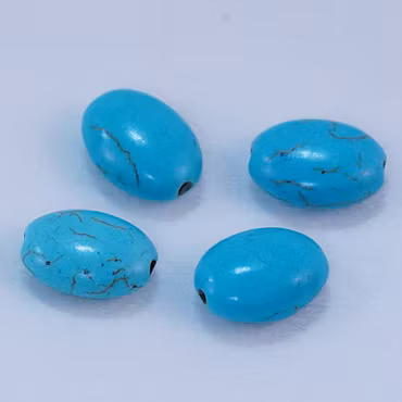 Oval turkos 13,5 x 10,3 x 6,2 mm