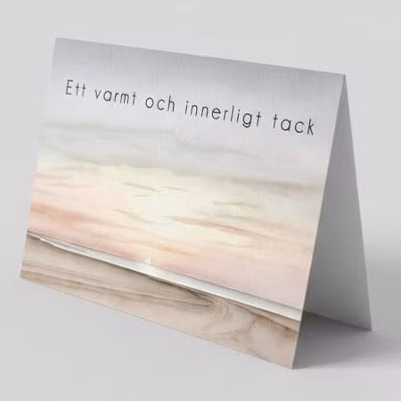 Färdigt tackkort till efter begravningen med motiv av solnedgång ofrankerat premium kuvert.