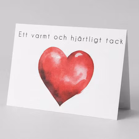 Färdiga tackkort till efter begravningen med motiv av rött hjärta inklusive ofrankerat premium kuvert.